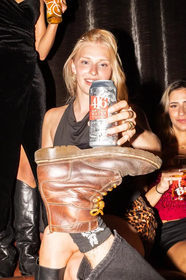 Draught beer and canned lager photographed with people enjoying them