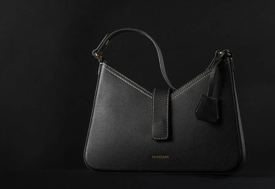 Leather handbags photographed on a minimal studio set