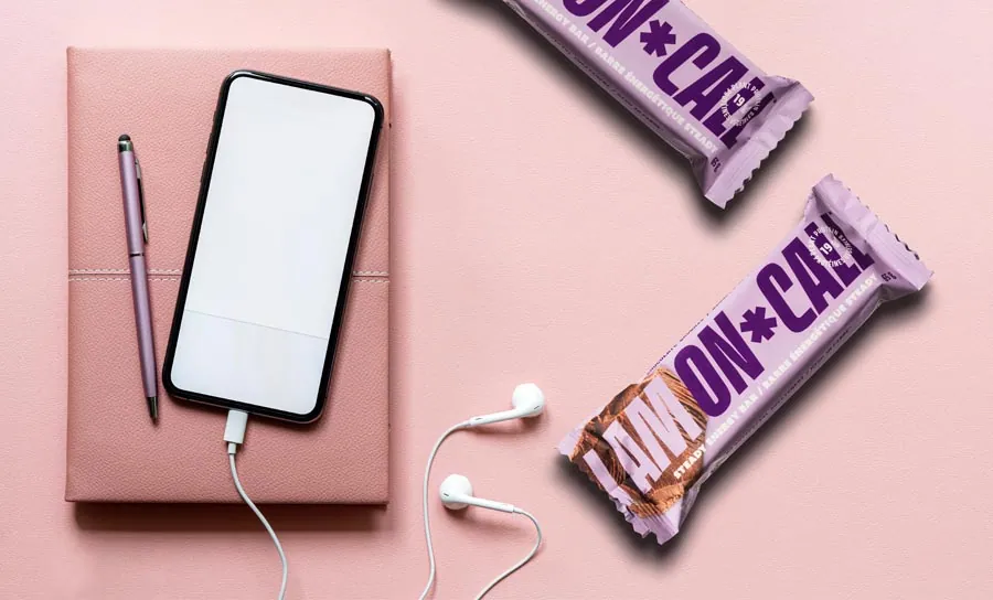 Packaged snack bars shot on bold coloured seamless backgrounds
